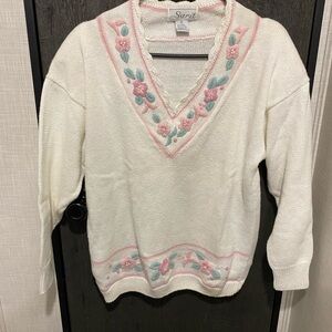 Pretty Sarit sweater size M. Please see pictures of discoloration.